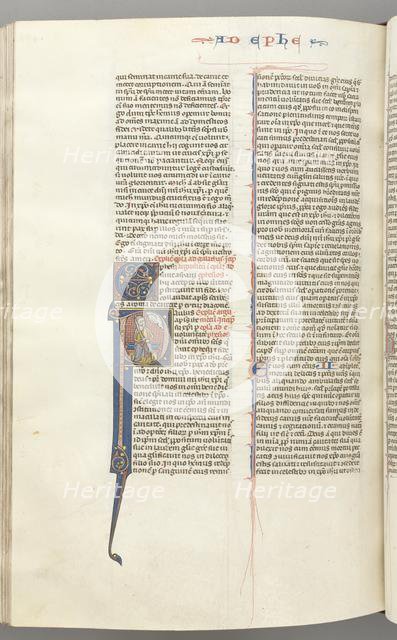Fol. 450v, Ephesians, historiated initial P, Paul seated with a sword, the bust of God above, c. 127 Creator: Unknown.