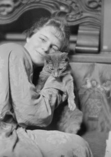 Cutler, Miss, with Buzzer the cat, portrait photograph, 1915 May 26. Creator: Arnold Genthe.