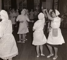 Women employees at Rowntrees Rock and Roll in their work clothes, York, Yorkshire, 1961. Artist: Unknown