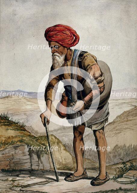 An old man of Simla, holding a stick, standing with a sack on his shoulder, 1866. Creator: R Clint.