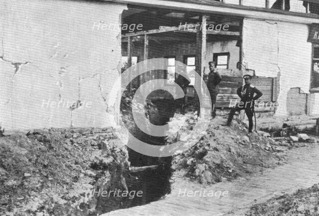 'La victorieuse offensive Russe; Une tranchee autrichienne dans une maison en ruines a..., 1916. Creator: Unknown.
