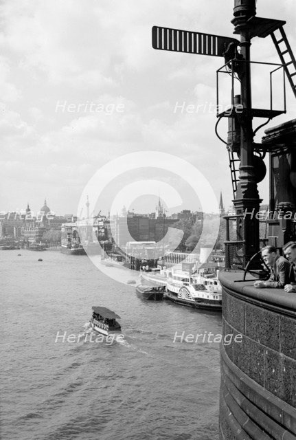 The River Thames at Stepney, London with a shipping signal in the foreground, c1945-c1965. Artist: SW Rawlings