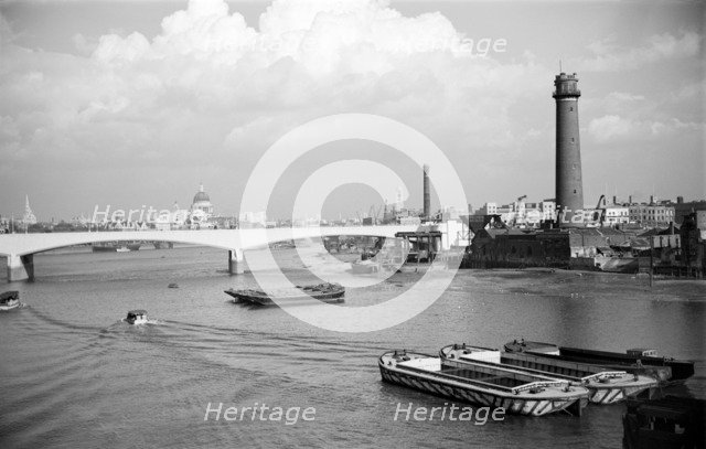 Waterloo Bridge, London, during its construction in 1937-42. Artist: SW Rawlings