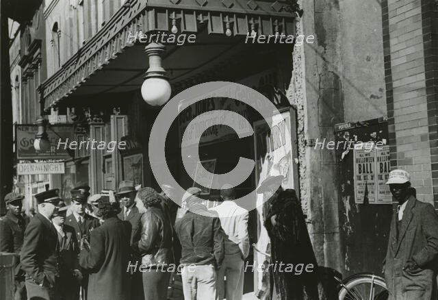 Entrance to a movie house, Beale Street, Memphis, Tennessee, October 1939. Creators: Farm Security Administration, Marion Post Wolcott.
