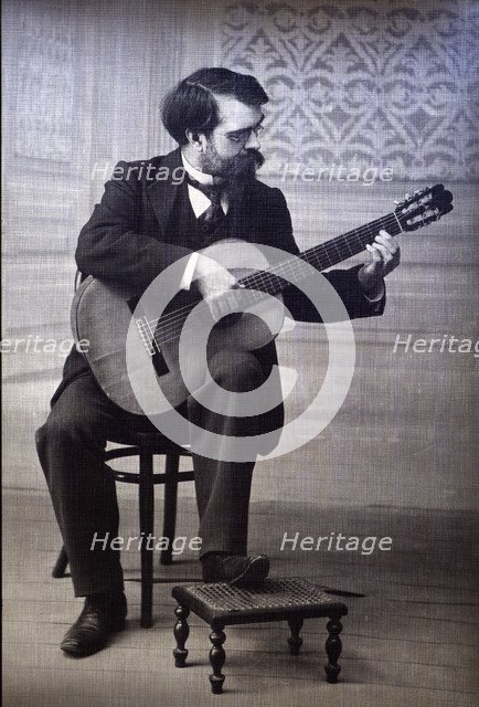 Francisco Tárrega Eixea (1852-1909), guitarist and composer, portrait playing guitar.