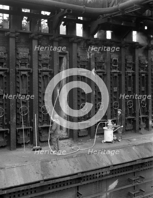 Spraying refractory linings at Manvers coking works, near Rotherham, South Yorkshire, 1963. Artist: Michael Walters