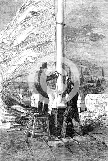 The Peace Rejoicings - Hoisting the Royal Standard at the Tower of London, 1856.  Creator: W Thomas.