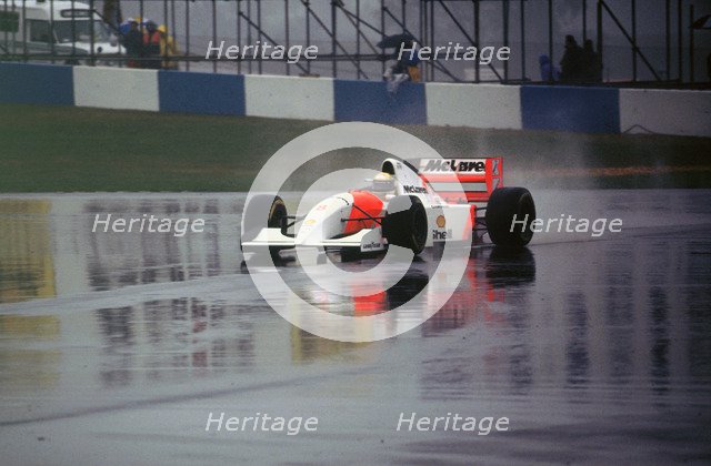 Ayrton Senna in the McLaren MP4-8 1993 European Grand Prix at Donington Artist: Unknown.