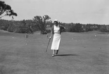 Cassidy, Ellen, Mrs., on golfcourse, 1932 July. Creator: Arnold Genthe.