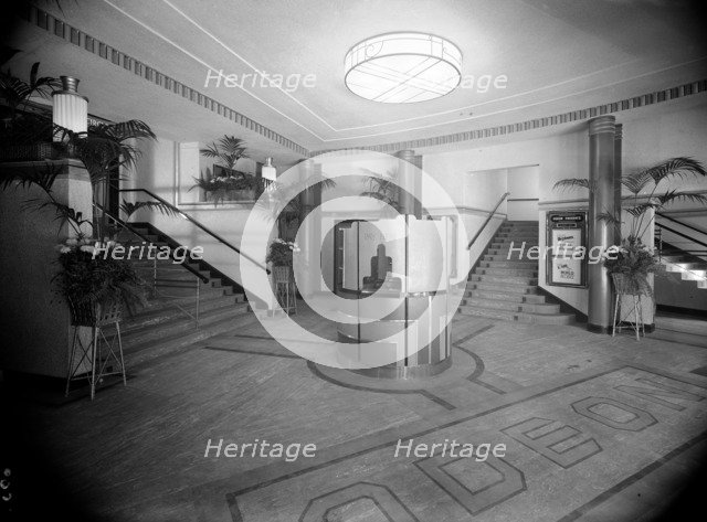Entrance foyer to Odeon cinema, Chingford Mount, London, c1935. Artist: J Maltby