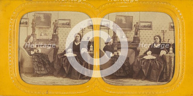 Two women seated in a parlor, one is sewing, the other with a hand fan in her lap, 1860s. Creator: E Lamy.