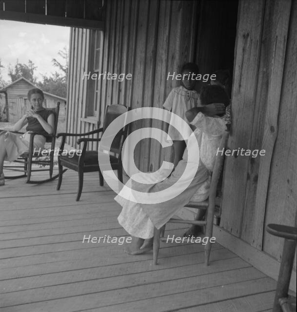 Wife of tenant farmer with two of her six children..., Chatham County, N Carolina, 1939. Creator: Dorothea Lange.