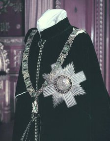 The robes and insignia of the Order of the Thistle, 1953. Creator: Arthur Charles Kirby Ware.