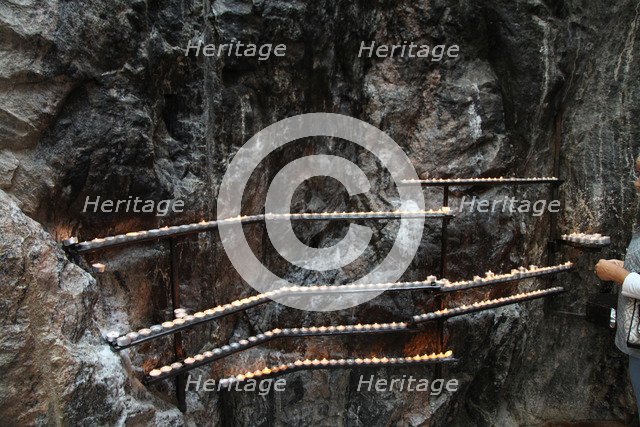Candles in Temppeliaukio Church, Helsinki, Finland, 2011.  Artist: Sheldon Marshall