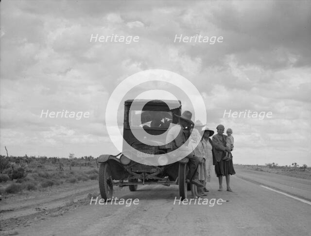 Three related Oklahoma drought refugee families near Lordsburg, New Mexico, 1937. Creator: Dorothea Lange.