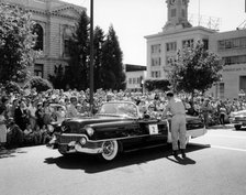 Cadillac convertible in a street parade, USA, (c1958?). Artist: Unknown