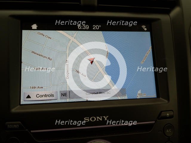In-car Satellite Navigation screen. Creator: Unknown.