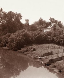 Houses on Water Street, from the bridge, Fredericksburg, Virginia, between 1927 and 1929. Creator: Frances Benjamin Johnston.