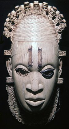 An ivory mask from Benin, Nigeria worn by the Oba of Benin on ceremonial occasions. Artist: Unknown