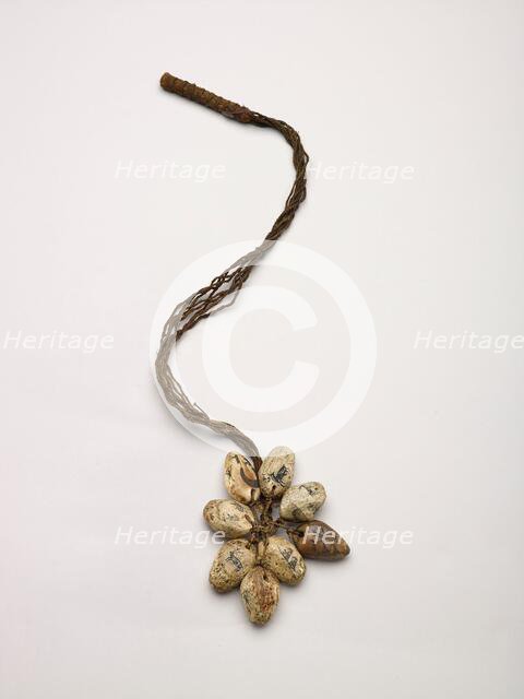 Bird bola wtih eight incised ivory pieces, 1875-1900. Creator: Unknown.