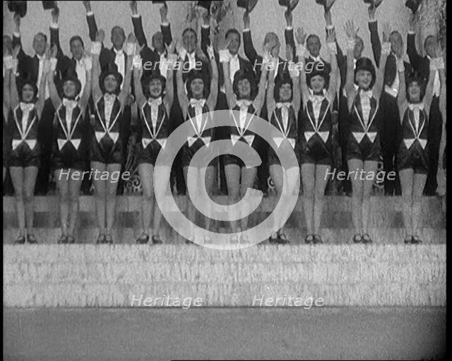 Scene from a Stage Show: a Large Dance Troop Tap Dancing on Steps in Top Hats, 1929. Creator: British Pathe Ltd.