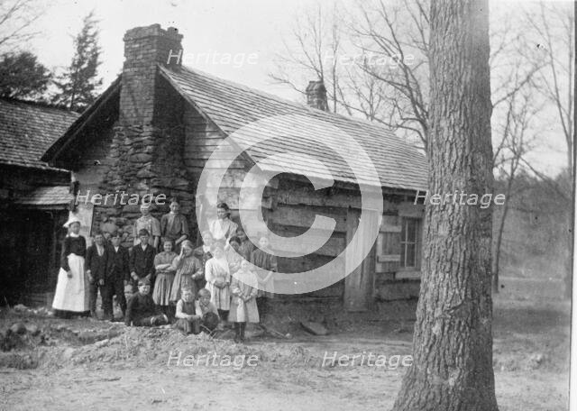 Mountaineers Cabin And Family of 15, 1913. Creator: Harris & Ewing.