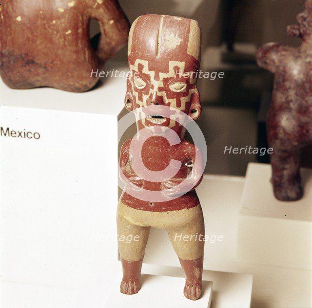 Pottery Figure of standing woman, face painted with fret pattern, Guanajuato, Mexico, 2000BC-300. Artist: Unknown.