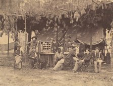 Chief Officer and Clerks of the Ambulance Department, 9th Army Corps, in Front of P..., August 1864. Creator: Tim O'Sullivan.