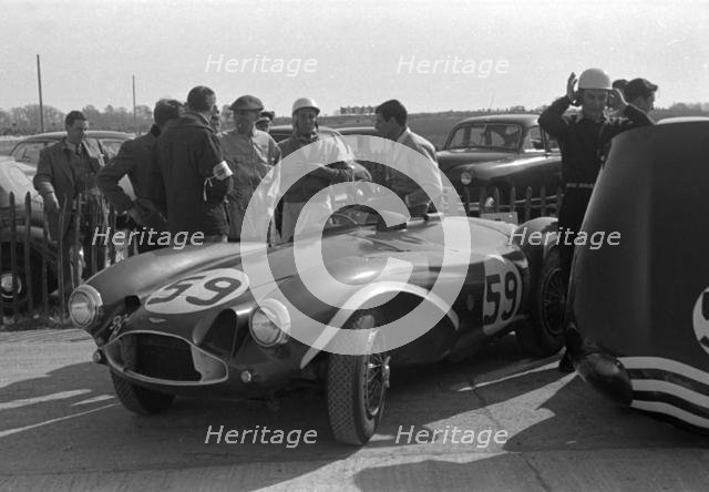 Aston Martin DB3S, Stirling Moss in paddock at Goodwood International Sports Car Race 1956. Creator: Unknown.