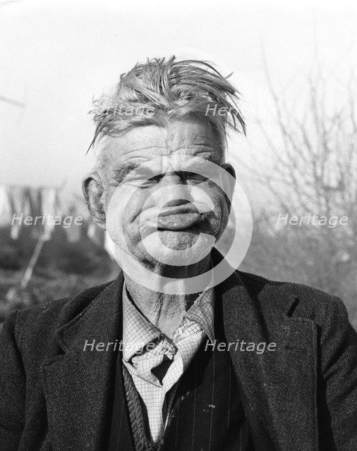 Gipsy pulling a 'gurney face', Lewes, Sussex, 1964. 
