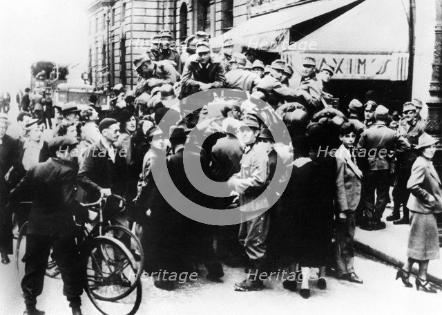 German soldiers outside Maxim's restaurant, Paris, July 1940. Artist: Unknown