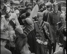 Crowds Watching a Group of Well Dressed People, 1930s. Creator: British Pathe Ltd.