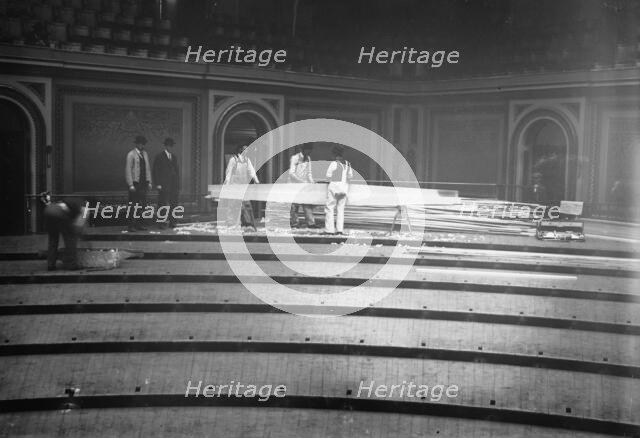 Tearing up floor of House of Reps., between c1910 and c1915. Creator: Bain News Service.