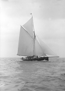 The cutter 'Vanity' sailing close-hauled, 1913. Creator: Kirk & Sons of Cowes.