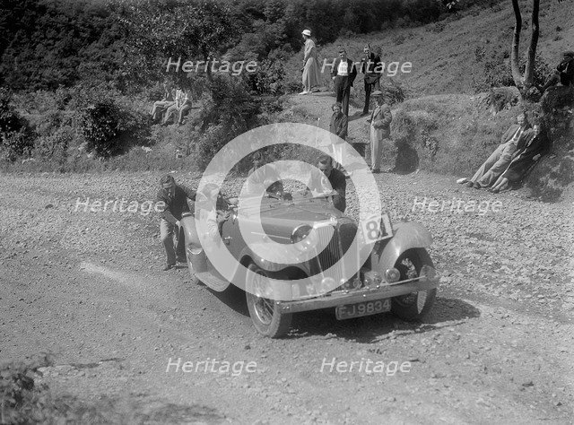 Jaguar SS open 2-seater at the Mid Surrey AC Barnstaple Trial, Beggars Roost, Devon, 1934. Artist: Bill Brunell.