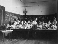 Group of young women studying plants in normal school, Washington, D.C., (1899?). Creator: Frances Benjamin Johnston.
