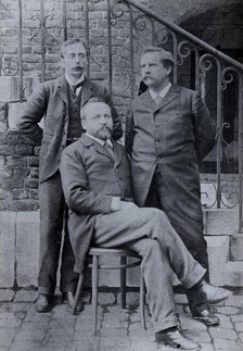 Charles Sherrington (left), Leon Fredericq (seated) and Paul Grützner (right) outside the...(1940?). Creator: Unknown.
