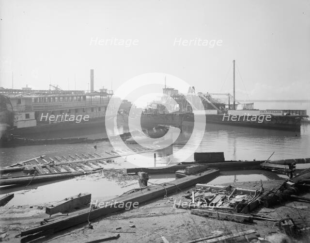 Old boats beached to rot away, New York City, between 1900 and 1910. Creator: Unknown.