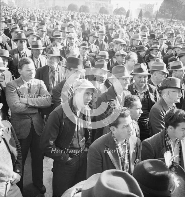Listening to speeches at mass meeting of WPA workers protesting..., San Francisco, California, 1939. Creator: Dorothea Lange.