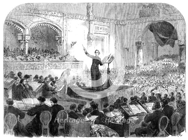 Franz Liszt conducting the performance of his new oratorio at Pesth, 1865. Creator: Unknown.