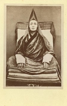 Full-length portrait of the grand lama of the Selenginsk lamasery, seated..., between 1870 and 86. Creator: Unknown.