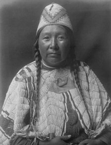 Wife of Mnainak-Yakima, c1910. Creator: Edward Sheriff Curtis.