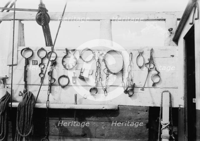 Torture irons on SUCCESS, between c1910 and c1915. Creator: Bain News Service.