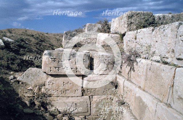 Cuneiform inscriptions on stones, ruined aqueduct, Jerwan, Iraq, 1977.
