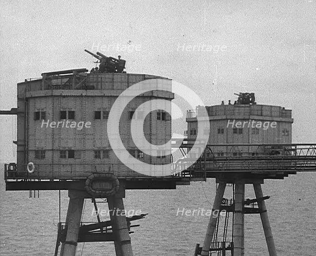 Anti-Aircraft Guns on a British Maunsell Army Fort Off the British Coast, 1940. Creator: British Pathe Ltd.