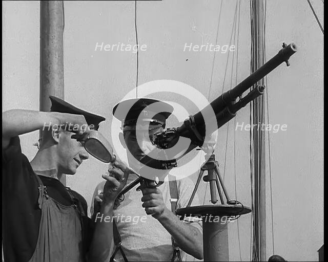 British Sailors Mounting Machine Guns To Small Boats for the Dunkirk Evacuation, 1940. Creator: British Pathe Ltd.