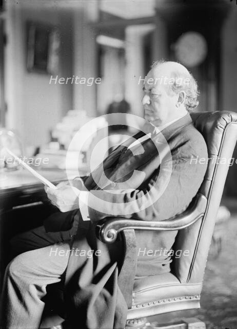 William Jennings Bryan, Rep. from Nebraska, at desk, 1914. Creator: Harris & Ewing.