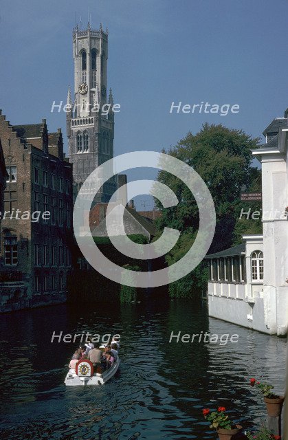 Canal, old houses, and the Belfrey of the Tour Des Halles in Bruges. Artist: Unknown