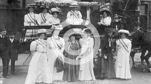 Suffragettes in 'Votes for Women' sashes, c1910. Artist: Unknown