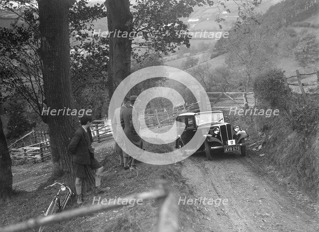 1934 Standard Big Nine taking part in a Standard Car Owners Club trial. Artist: Bill Brunell.